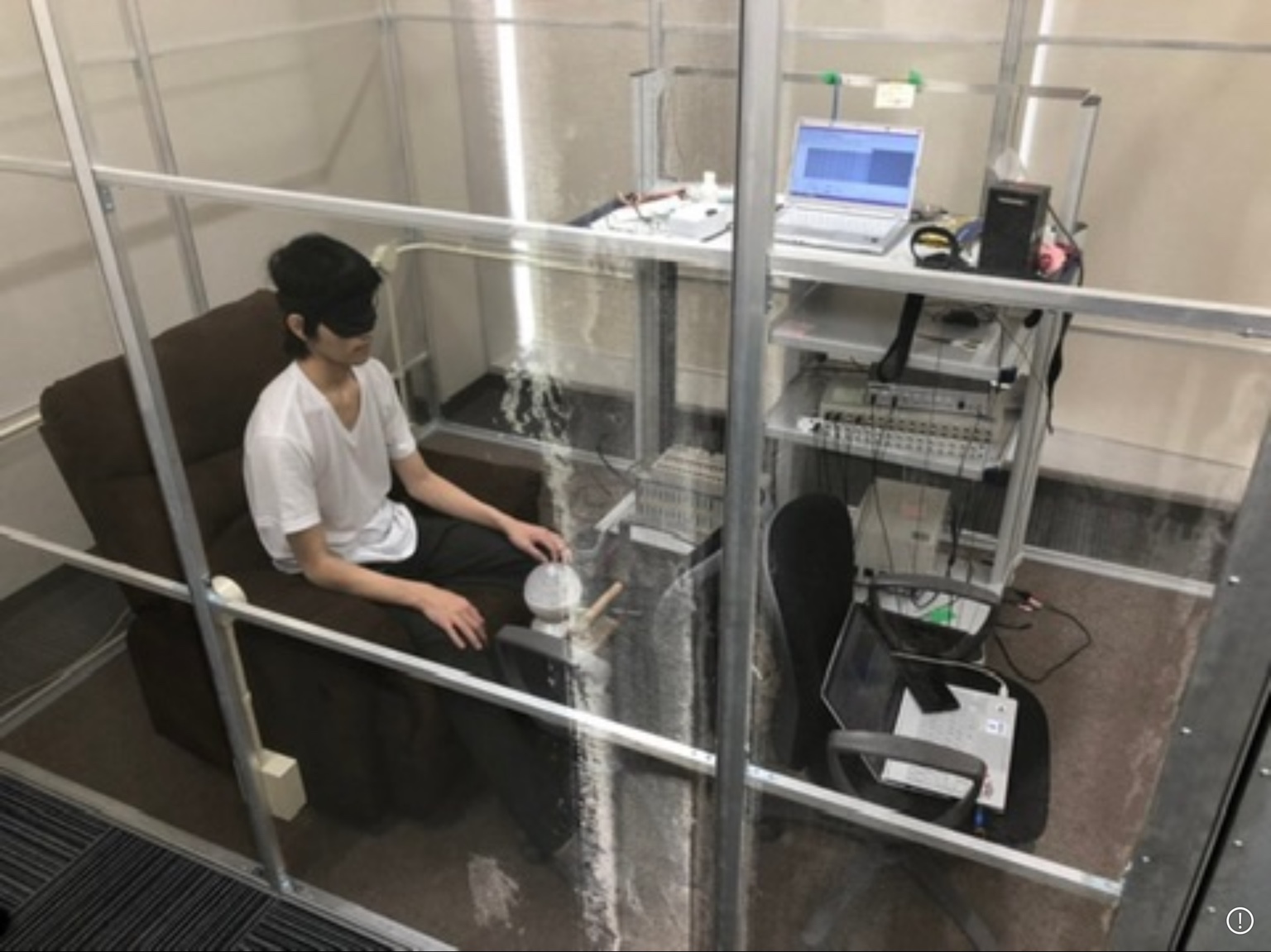 Experimental environment for olfactory stimulation and frontal EEG; a diffuser is placed in the center